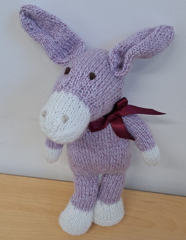 Standing knitted donkey